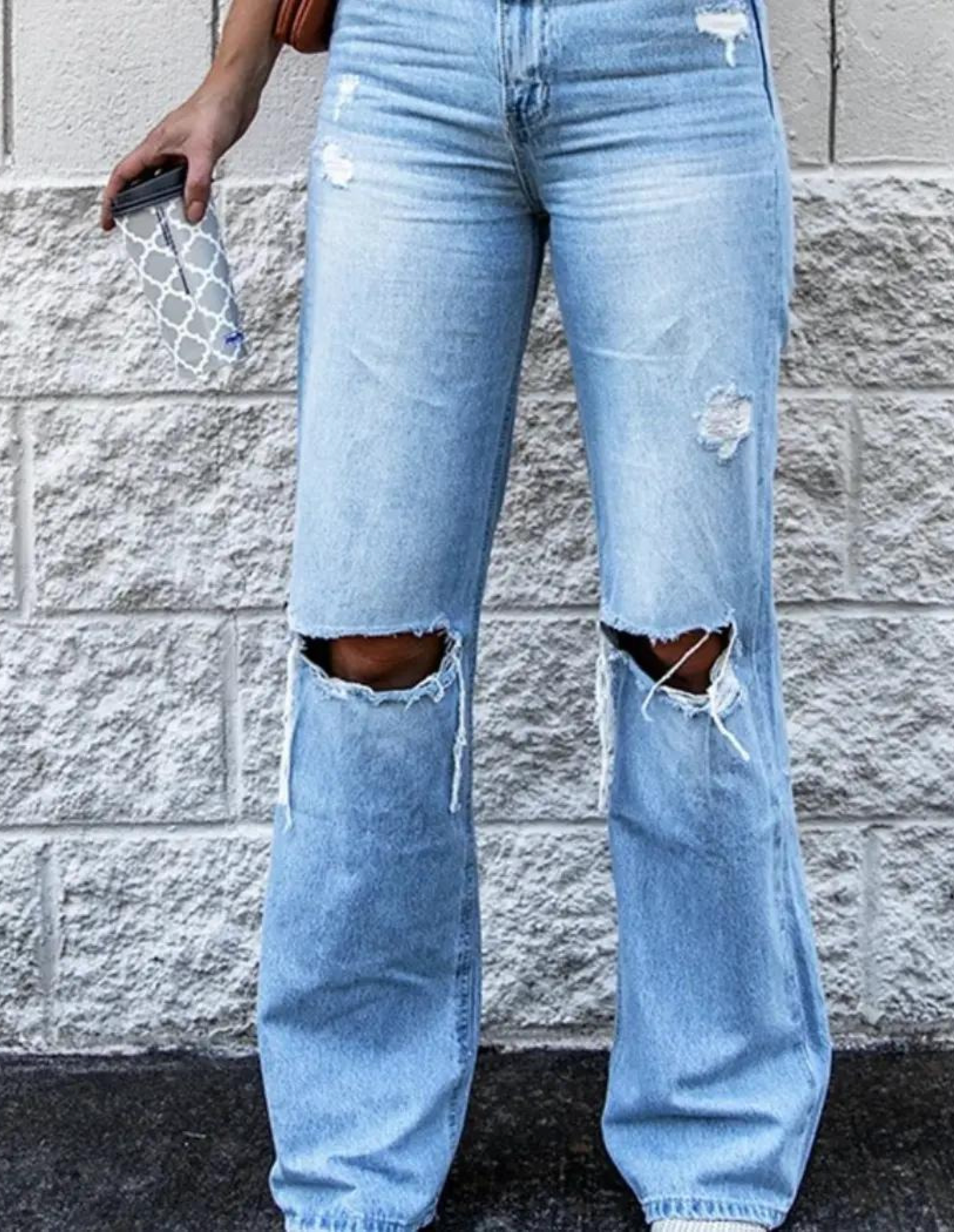 Denim wide leg jeans with holes in each knee